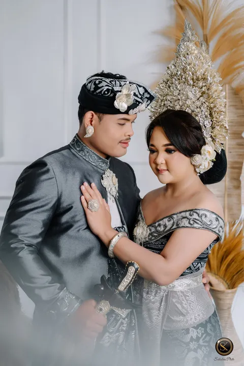 Foto sampul undangan Purnami & Supriana