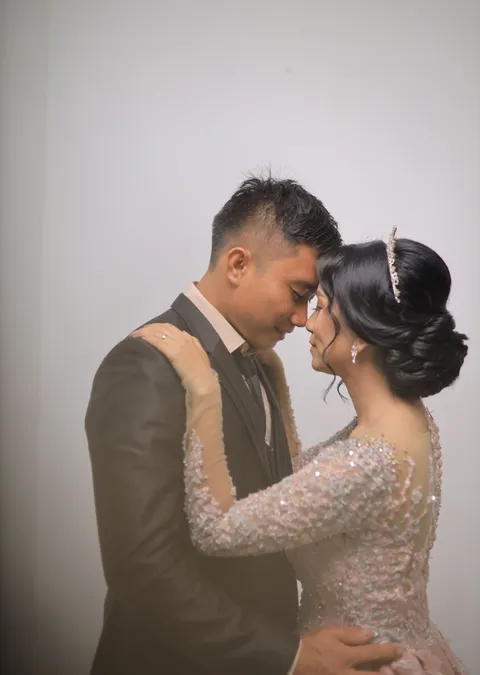 Foto sampul undangan Mangasi & Elin