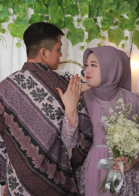 Foto sampul undangan Putri & Dicky